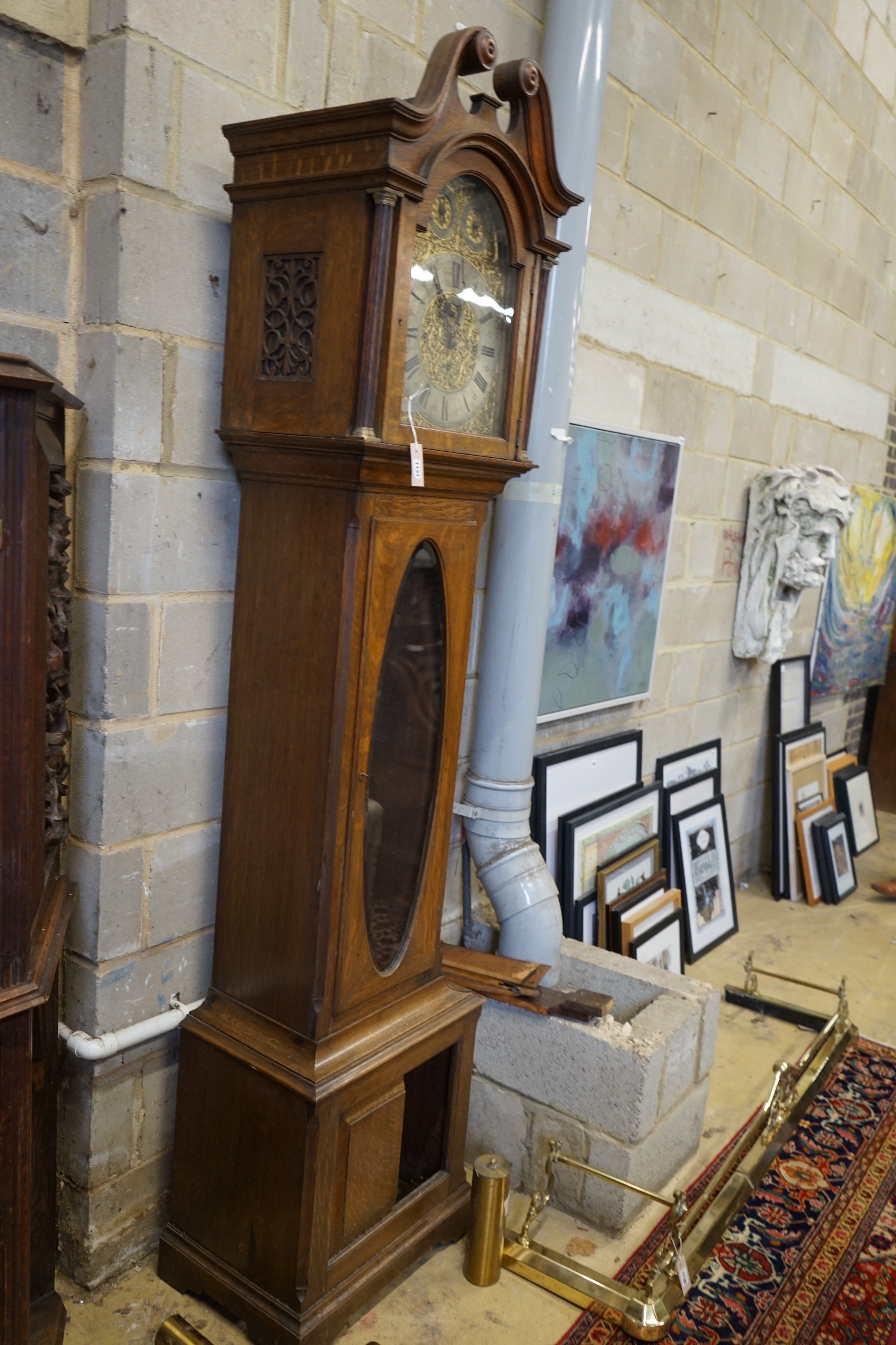 An early 20th century oak Westminster chiming 8 day longcase clock, height 236cm